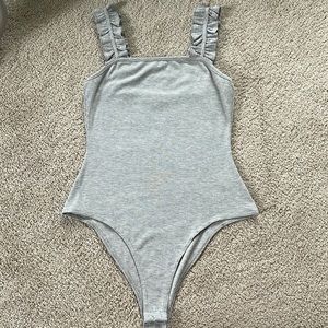 Gray body suit